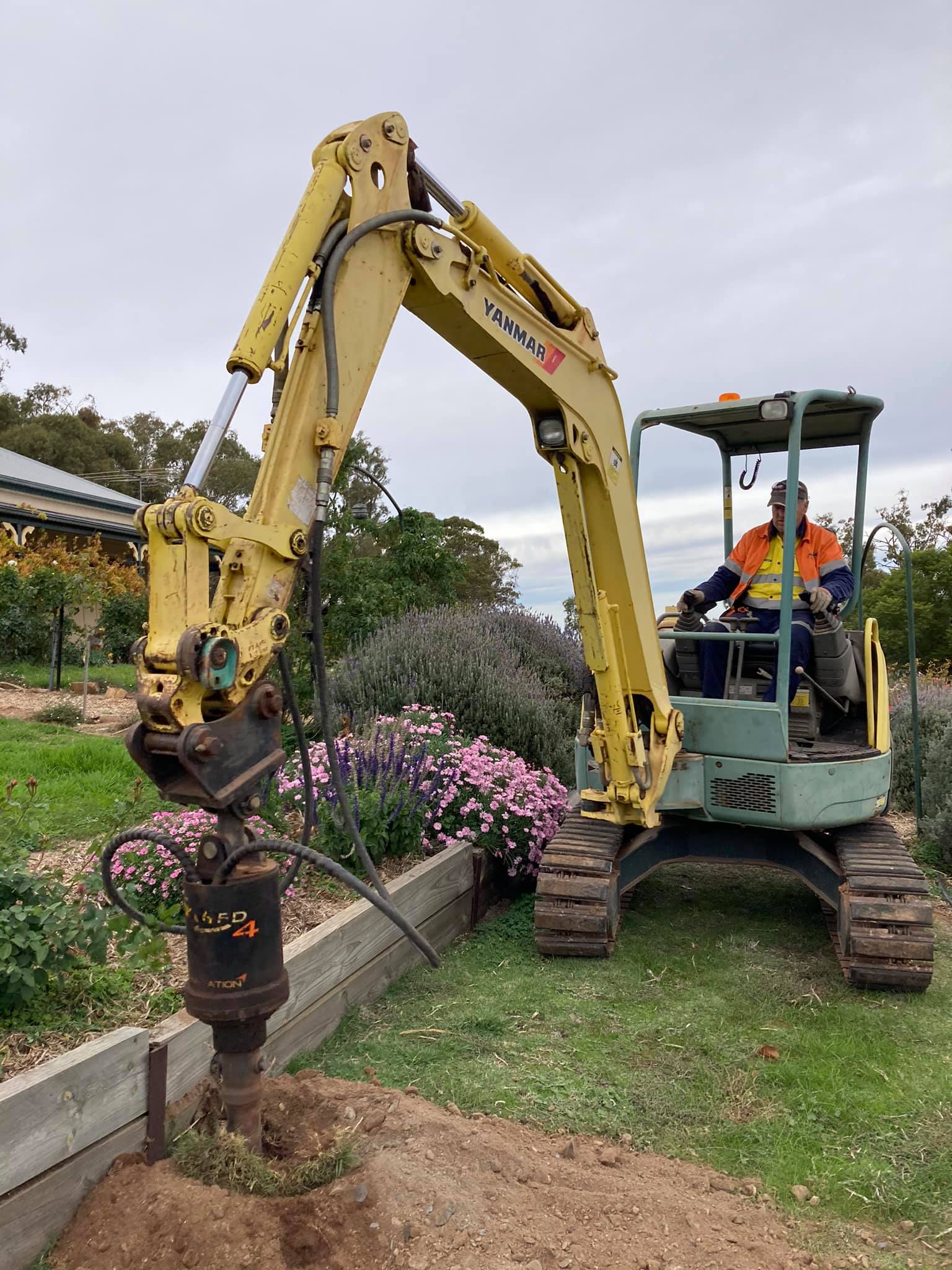 post hole digging with reach excavator